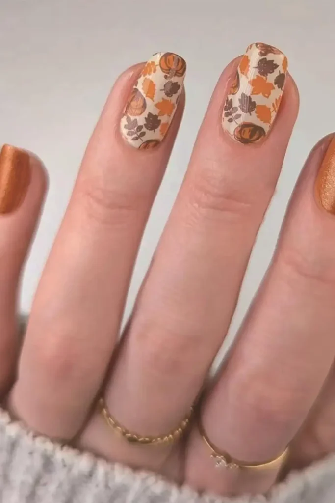 7. Maple Leaf and Pumpkin Nails